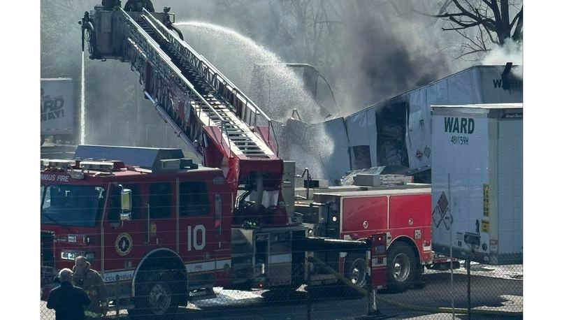 This photo released by the Columbus Fire Department shows firefighters tending to a fire that began on a trailer carrying lithium batteries in Columbus, Ohio on Thursday, April 18, 2024. (Columbus Fire Department via AP)