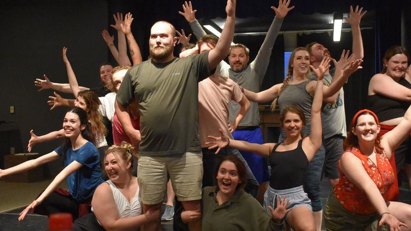 Zach King (center as Nick Bottom) and the cast of TheatreLab Dayton's production of "Something Rotten!" in rehearsal. CONTRIBUTED