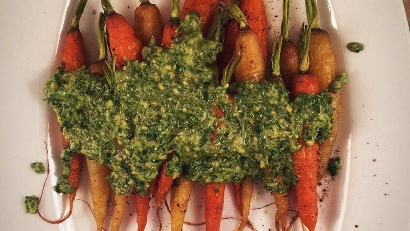 Surprise your guests with Carrot-Topped Pesto served with Roasted Carrots. CONNIE POST/STAFF