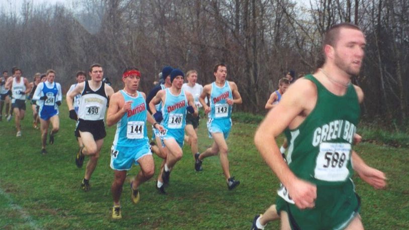 The Dayton cross country team races in Chapel Blue uniforms in 2003. Contributed photo