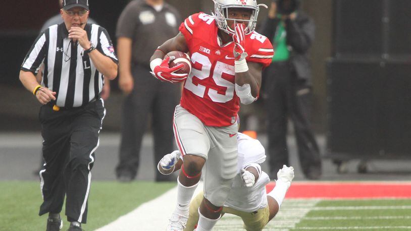 Ohio State’s Mike Weber carries the ball in the second quarter. David Jablonski/Staff
