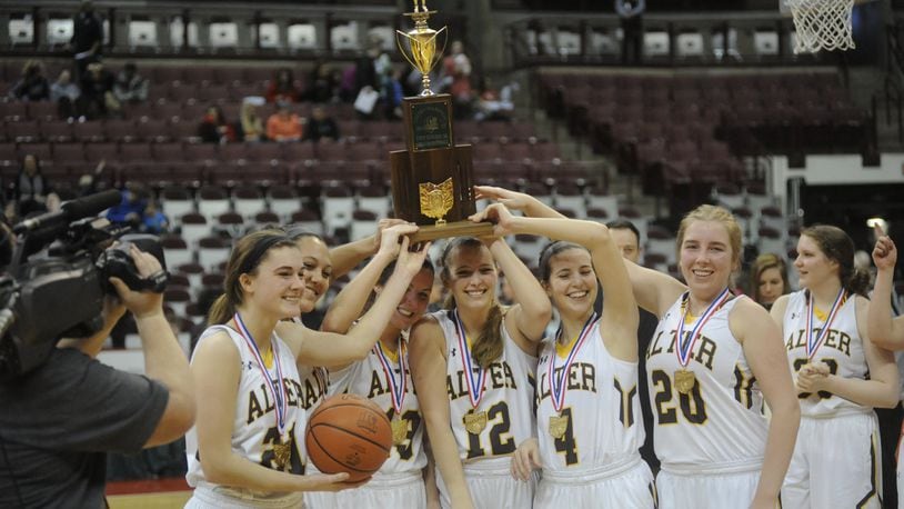 Alter seniors Libby Bazelak (left), Braxtin Miller, Olivia Gillis, Nicole Hoeflinger, Lauren Lush and Emily Long hoist the D-II championship trophy. Alter defeated Shaker Heights Hathaway Brown 58-41 to win its third straight D-II girls high school basketball state championship at OSU’s Schottenstein Center in Columbus on Saturday, March 18, 2017. MARC PENDLETON / STAFF