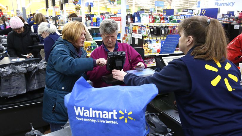 Wal-Mart is teaming up with a department store to form an “anti-Amazon” coalition of retailers, the WSJ reports. TY GREENLEES / STAFF