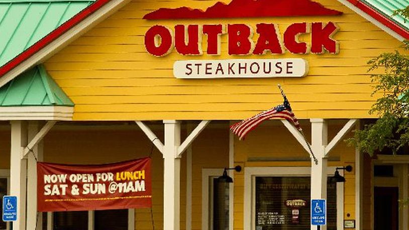 An Outback Steakhouse is planned for space at the Dayton Mall formerly occupied by the Sears Auto Center, according to Miami Twp. officials. FILE PHOTO