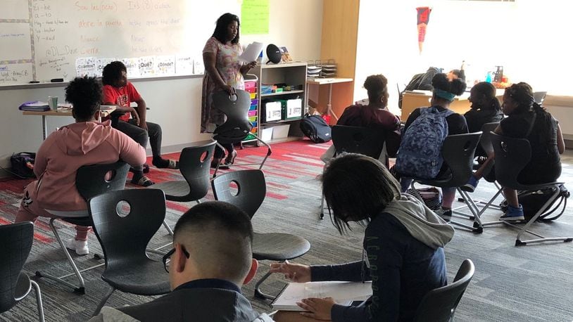 Dayton Early College Academy teacher Maria Ogletree works with her freshman advisory students on questions related to having a growth mindset, Monday, Sept. 16, 2019. DECA was the highest-scoring local charter school on the Ohio Department of Education’s annual school report card. JEREMY P. KELLEY / STAFF