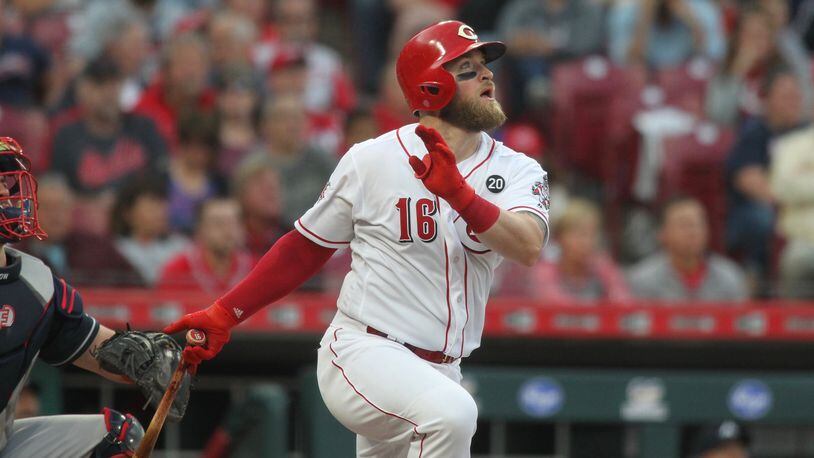 The Reds Tucker Barnhart hits a home run in the fourth inning against the Braves on Tuesday, April 23, 2019, at Great American Ball Park in Cincinnati. David Jablonski/Staff