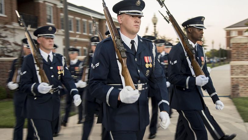 U.S. Air Force Honor Guard members march during the U.S. Air Force Tattoo at Joint Base Anacostia-Bolling, Washington, D.C., Sept. 13, 2017. Service members from across the National Capital Region attended the tattoo in commemoration of the Air Force’s 70th anniversary. (U.S. Air Force photo by Airman 1st Class Valentina Lopez)