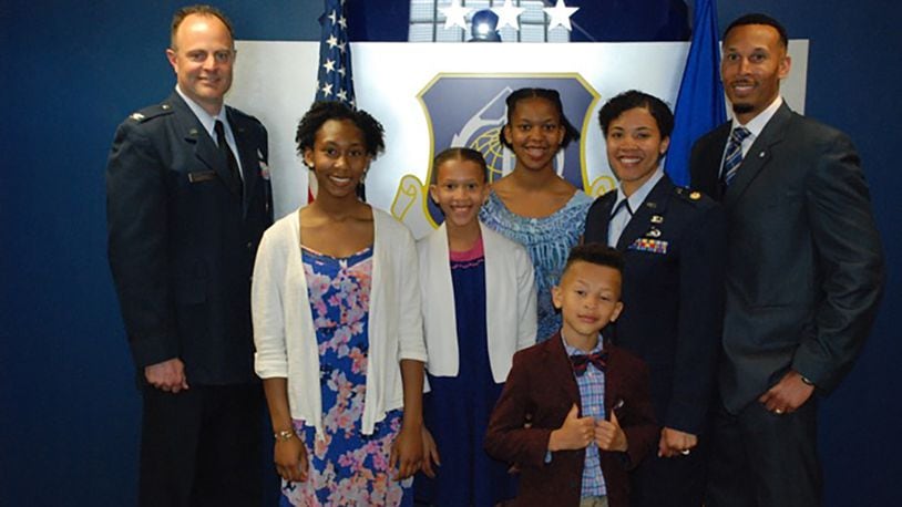 Maj. Jazmyn Hyman celebrates her promotion with her family during a virtual ceremony in May. U.S. Air Force photo/courtesy Maj. Jazmyn Hyman