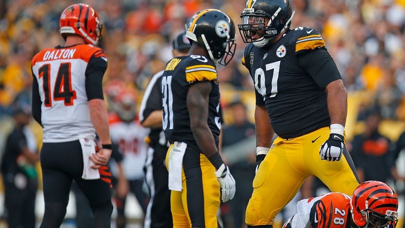 PITTSBURGH, PA - OCTOBER 22: Cameron Heyward #97 of the Pittsburgh Steelers reacts after a defensive stop in the first half during the game against the Cincinnati Bengals at Heinz Field on October 22, 2017 in Pittsburgh, Pennsylvania. (Photo by Justin K. Aller/Getty Images)