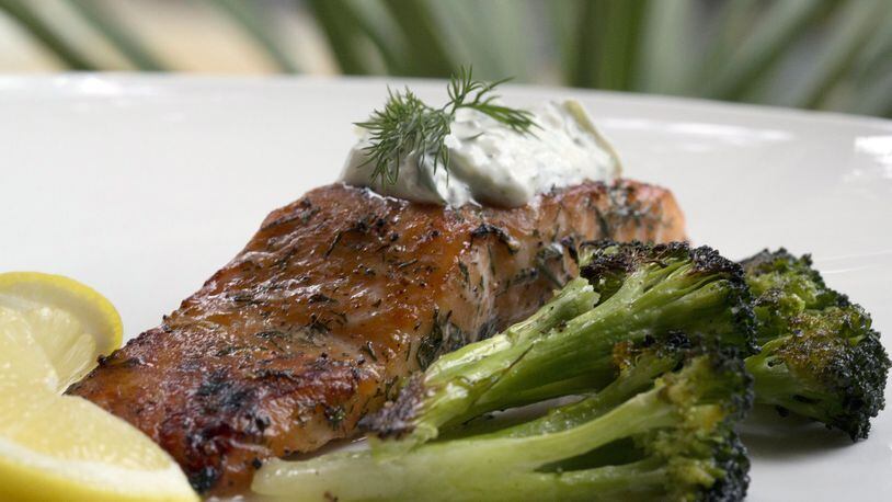 Dill and Sugar Brined Broiled Salmon with roasted broccoli. It can be topped with Cucumber-Yogurt Sauce. (Kathleen Galligan/Detroit Free Press/TNS)