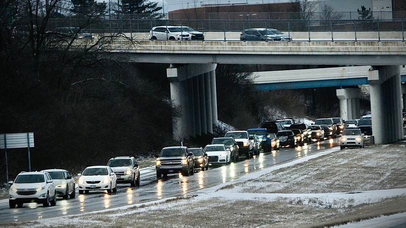 Icy roads on Interstate 675 near Fairborn caused several crashes and slide offs. Most of the Dayton area was covered in ice, causing several accidents all throughout the area Tuesday, March 14, 2023. MARSHALL GORBY \STAFF