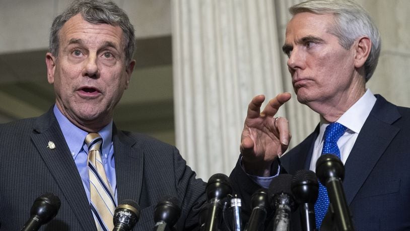 Sen. Sherrod Brown (D-OH) and Sen. Rob Portman (R-OH) (Photo by Drew Angerer/Getty Images)