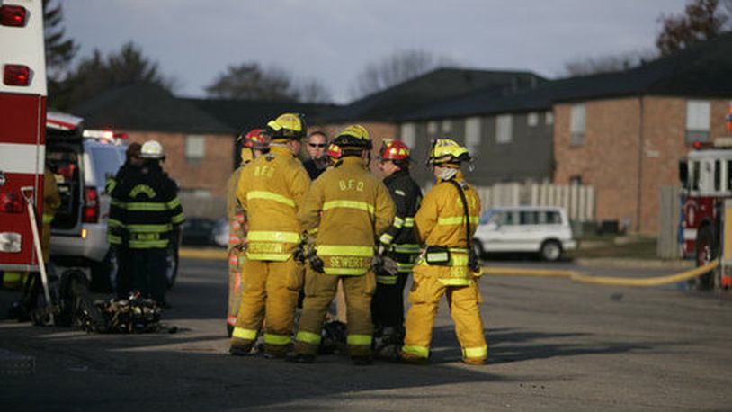 Englewood firefighters respond to an apartment fire at Deer Creek Apartment on Shioh Springs Road near Olive Road. The residence escaped without injury. Two families were affected by the blaze on Oct. 27, 2008.