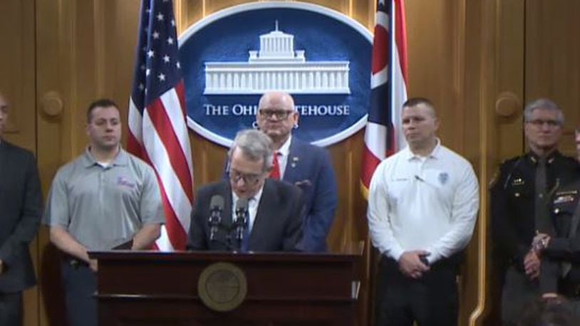 Warren County Sheriff Larry Sims (at right) was in Columbus Monday as Gov. Mike DeWine announced that the Greater Warren County Drug Task Force was awarded $50,030 from the RecoveryOhio Law Enforcement Fund.