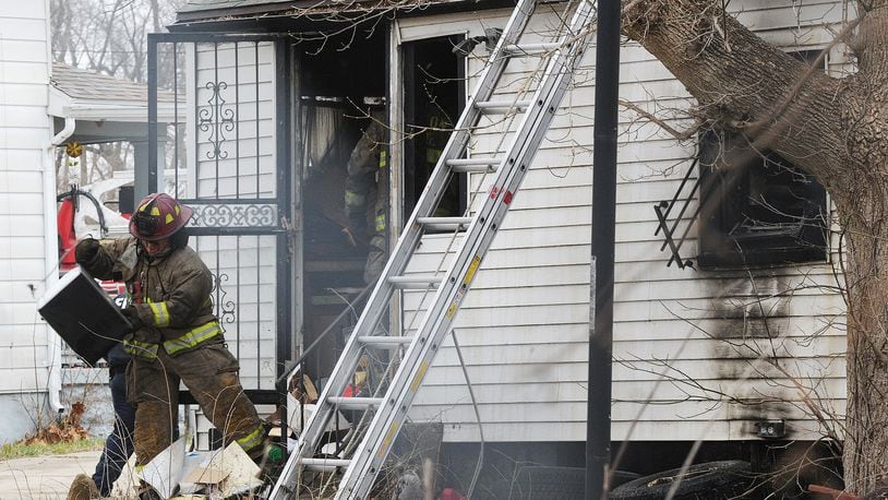No injuries were reported at a house fire on Ferguson Avenue in Dayton on Monday, Jan. 11, 2021. STAFF/MARSHALL GORBY