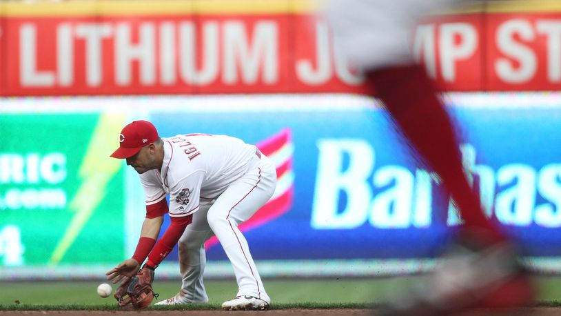 Reds shortstop Jose Iglesias fields a ball against the Braves on Tuesday, April 23, 2019, at Great American Ball Park in Cincinnati. David Jablonski/Staff