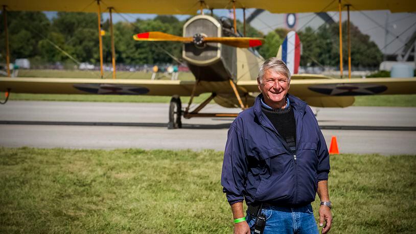 Dave Egner, director of special operations at Wright-Patterson Air Force Base, is retiring April 2 after more than 40 years of service. Here, he stands in front of a Stinson 108 during the 2018 World War I Dawn Patrol event at the National Museum of the U.S. Air Force, while he served as the air boss. CONTRIBUTED PHOTO/MIKE LENT, ALBA AUDIO VISUAL