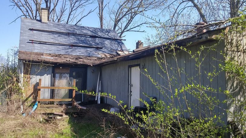 The Butler County land bank has approved funding a new demolition — this home in Madison Twp. that used to be the place where a man would wrestle his bear in the fenced-in yard. CONTRIBUTED
