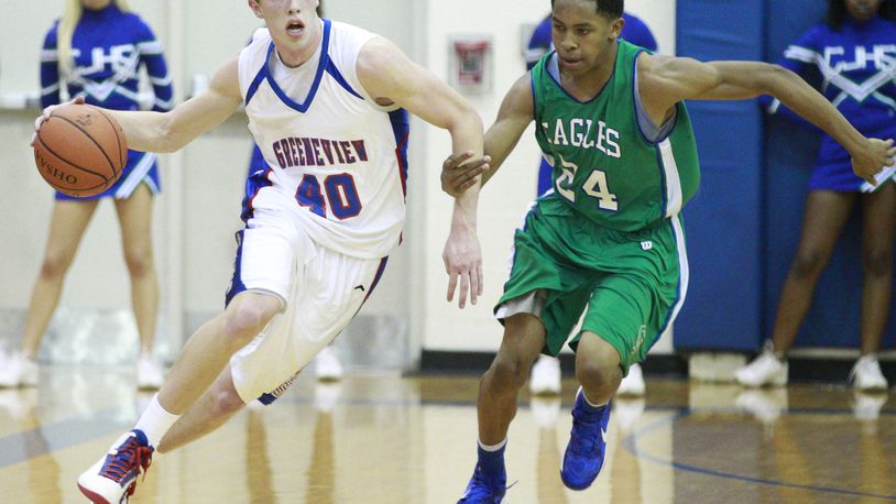 Evan Bradds (40) of Greeneview is guarded by William Peterson (24) of Chaminade Julienne during Friday’s basketball game at Greeneview on Nov. 30, 2012. Photo by Barbara J. Perenic/Cox Media Group