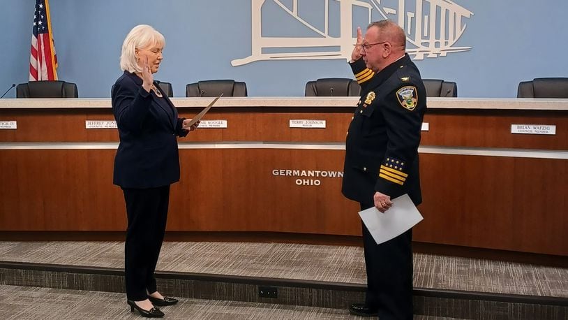 Germantown City Manager Judy Gilleland swears in Matt Burns as the city's new police chief Monday, April 22, 2024. CONTRIBUTED