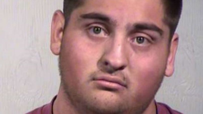 Dustin Warren Saldana was arrested Saturday in Phoenix.