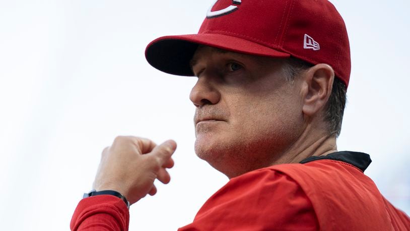 Cincinnati Reds manager David Bell stands in the dugout during the seventh inning of the team's baseball game against the Washington Nationals on Friday, June 3, 2022, in Cincinnati. (AP Photo/Jeff Dean)