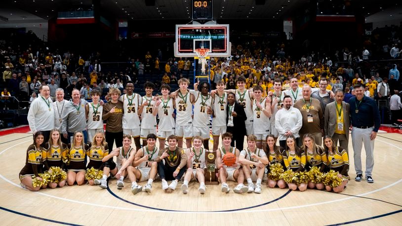 Alter poses with its Division II state championship trophy Sunday at UD Arena after defeating Zanesville Maysville 68-54. Logan Howard/CONTRIBUTED