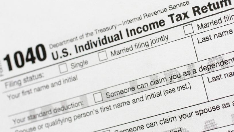 FILE - This July 24, 2018, file photo shows a portion of the 1040 U.S. Individual Income Tax Return form. It’s the time of year to start thinking about taxes - what's ahead and what can be done now to manage. But the upcoming tax filing season is going to be trickier for many Americans due to rampant unemployment, working from home and general upheaval due to COVID-19. (AP Photo/Mark Lennihan, File)