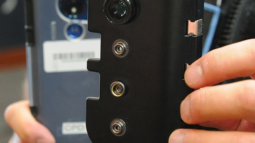 These are the new body worn cameras Clayton Police have started wearing. This week, Franklin City Council approved the purchase of body cameras for their police officers. Franklin joins Lebanon and the Ohio State Highway Patrol as the only Warren County law enforcement agencies to use body cameras. MARSHALL GORBY\STAFF