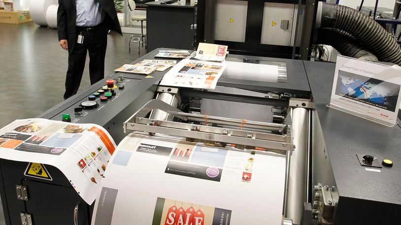 A Kodak vice president of digital printing talks about Kodak Prosper printers at the company’s Kettering plant in this 2013 photo. TY GREENLEES / STAFF