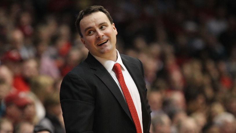 Archie Miller smiles as he talks to an official during a game Friday against Austin Peay. David Jablonski/Staff