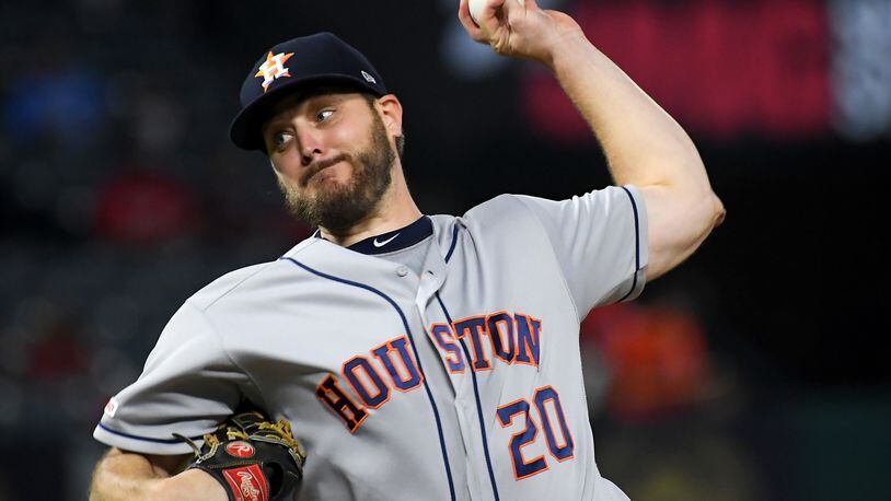ANAHEIM, CA - SEPTEMBER 26: Wade Miley #20 of the Houston Astros pitches in the second inning of the game against the Los Angeles Angels at Angel Stadium on September 26, 2019 in Anaheim, California. (Photo by Jayne Kamin-Oncea/Getty Images)