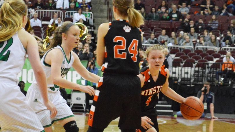 Ivy Wolf (with ball) gets a screen from Taylor Kogge. Minster defeated Waterford 46-31 in a girls high school basketball D-IV state semifinal at OSU’s Schottenstein Center in Columbus on Thursday, March 15, 2018. ERIC FRANTZ / CONTRIBUTOR