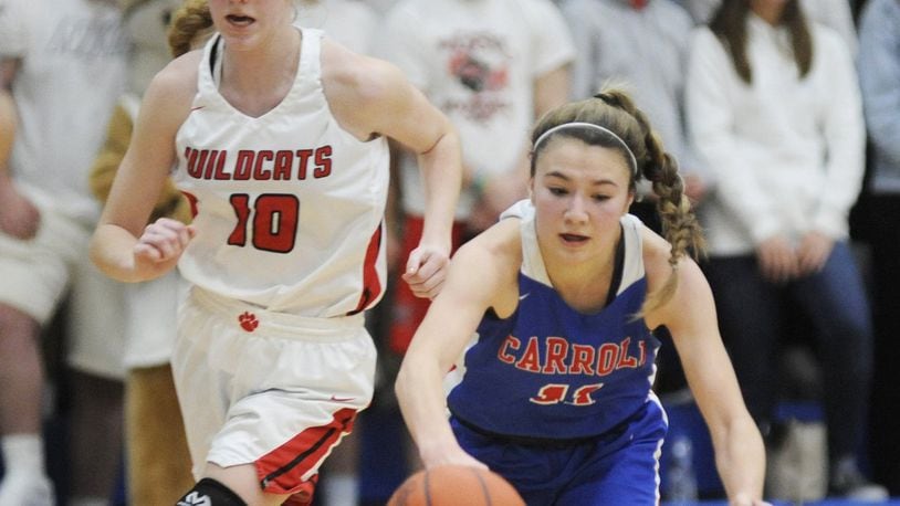 Ava Lickliter of Carroll (front) beats Jordan Rogers to the ball. Carroll defeated Franklin 57-43 in a girls high school basketball D-II regional final at Springfield High School on Friday, March 8, 2019. MARC PENDLETON / STAFF