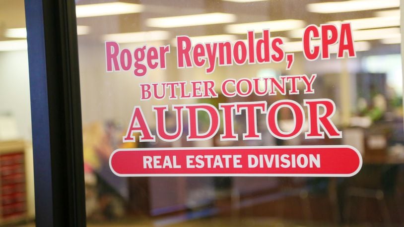 Butler County Auditor Roger Reynolds’ office has implemented the new federal income tax rates which provided an estimated $2.1 million annual benefit to county employees. GREG LYNCH / STAFF