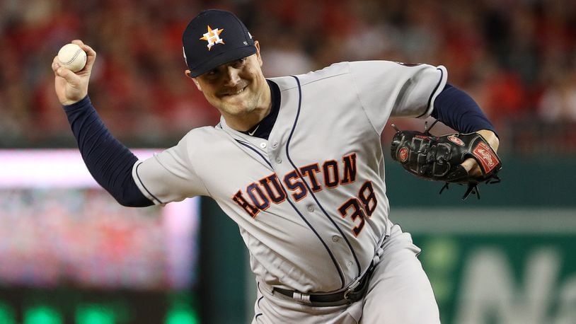 WASHINGTON, DC - OCTOBER 25: Wright State product Joe Smith  of the Houston Astros delivers the pitch against the Washington Nationals during the eighth inning in Game Three of the 2019 World Series at Nationals Park on October 25, 2019 in Washington, DC. (Photo by Patrick Smith/Getty Images)