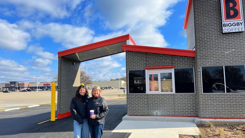Biggby Coffee is holding a grand opening for its newest store in the Dayton region at 5894 N. Springboro Pike in Miami Twp. on Tuesday, Dec. 19. Pictured is owner Laynae Meyer and her daughter, Raegan.