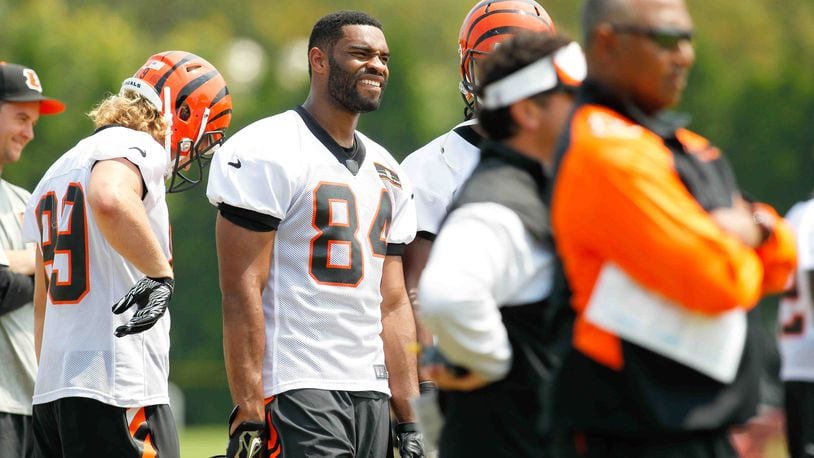 Cincinnati Bengals tight end Jermaine Gresham (84) watches a play during training camp practice Tuesday, Aug. 5, 2014, in downtown Cincinnati. NICK DAGGY / STAFF