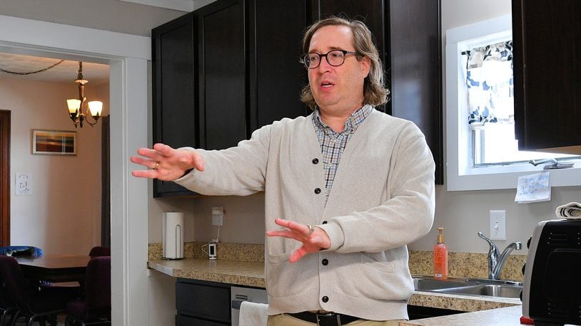 Mike Bessler discusses renovations to the kitchen at the Buckeye House in Troy. Contributed photo