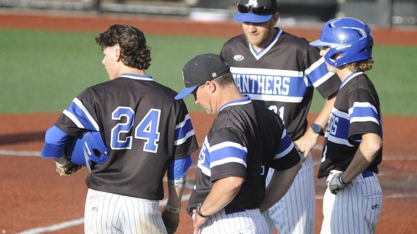 Springboro baseball coach Mark Pelfrey (near) has made all the right moves during the Panthers’ postseason run to the D-I state final four. With Pelfrey at UC’s Marge Schott Stadium are Ben Barber (24) assistant coach David Riley and Adam Schomburg during a 4-3 regional semifinal final defeat of Cin. Elder on Thursday, May 23, 2019. MARC PENDLETON / STAFF