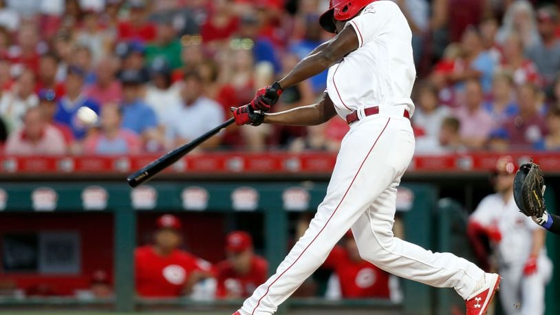CINCINNATI, OH - AUGUST 10:  Aristides Aquino #44 of the Cincinnati Reds hits a solo home run for his third home run of the game during the third inning against the Chicago Cubs at Great American Ball Park on August 10, 2019 in Cincinnati, Ohio. (Photo by Kirk Irwin/Getty Images)