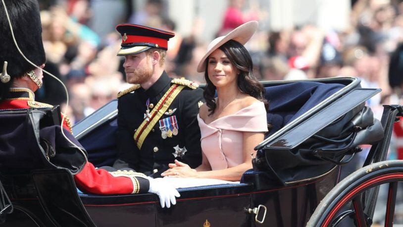 Prince Harry and Meghan Markle ride to Buckingham Palace on Saturday for the annual Trooping of the Colour.