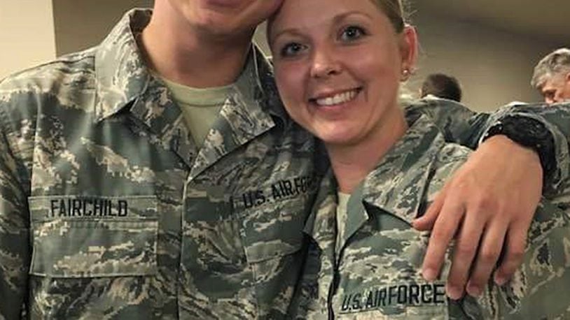 Senior Airman Amanda Guzman, 445th Force Support Squadron personnel systems management assistant, and her son, Senior Airman Stanley Fairchild, 89th Airlift Squadron loadmaster, pose for a photo in early December at the 445th Airlift Wing. COURTESY PHOTO