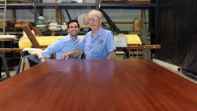 Brandon Hendrick and his grandfather Don Thomas at the three generation family owned cabinet business in West Carrollton Thomas Cabinet Company. CONTRIBUTED