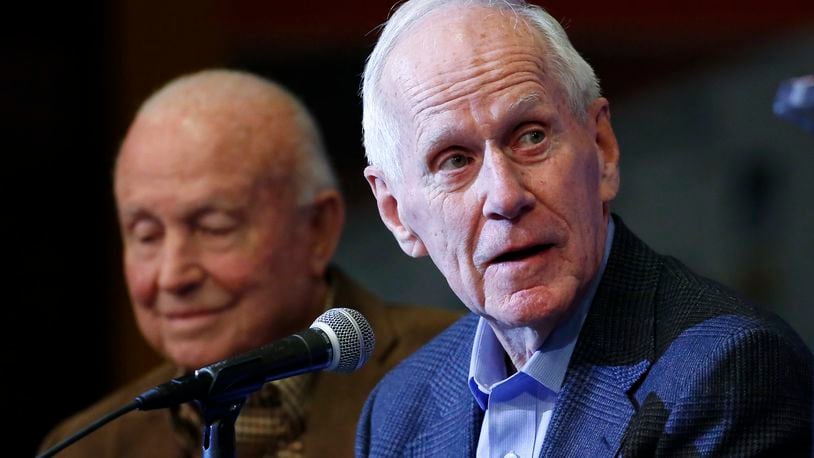 FILE - With former Illinois and New Mexico coach Lou Henson, left, by his side, retired Dayton coach Don Donoher talks about his career, during a news conference prior to a National Collegiate Basketball Hall of Fame induction event, Nov. 20, 2015, in Kansas City, Mo. Donoher, the winningest basketball coach at Dayton and a member of the National Collegiate Basketball Hall of Fame, has died. He was 92.. (AP Photo/Colin E. Braley, File)