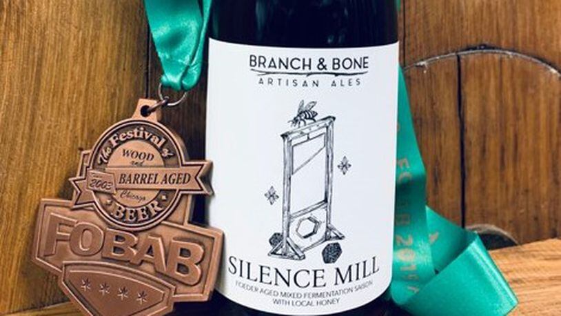 Dayton craft brewery Branch & Bone scores a bronze medal for its 'Silence Mill' at the Festival of Wood- and Barrel-Aged Beer held last weekend in Chicago.