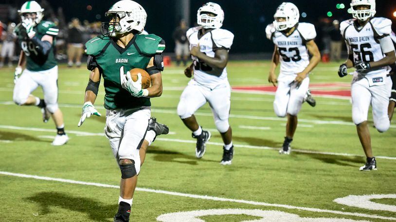 Badin’s Davon Starks carries the ball for a touchdown during a 41-21 win over Roger Bacon on Sept. 22, 2017, at Fairfield Stadium in Fairfield. NICK GRAHAM/STAFF