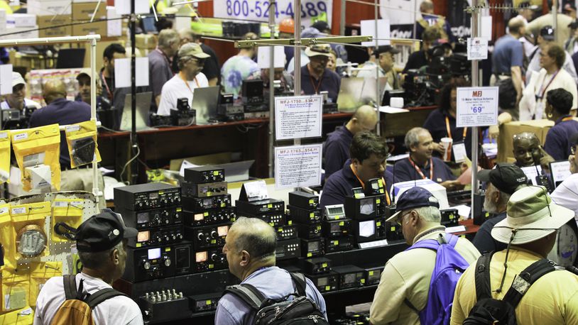 The Hara Arena floor fills up on opening day Friday, May 17, of the Dayton Hamvention 2013. The annual convention devoted to radio technology is expected to bring about 25,000 amateur radio enthusiasts to the Hara Complex in Trotwood before the show ends Sunday. CHRIS STEWART / STAFF