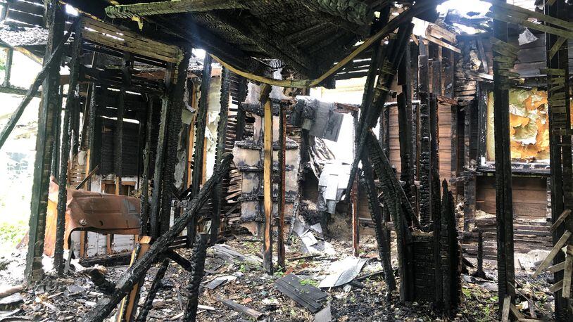 The inside of a fire-damaged home at 2030 E. Fourth St. CORNELIUS FROLIK / STAFF