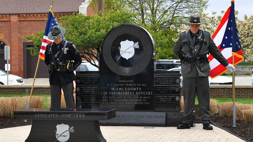 Members of the Miami County FOP Honor Guard stand at the Law Enforcement memorial during the annual Law Enforcement Memorial Service on May 3. Contributed